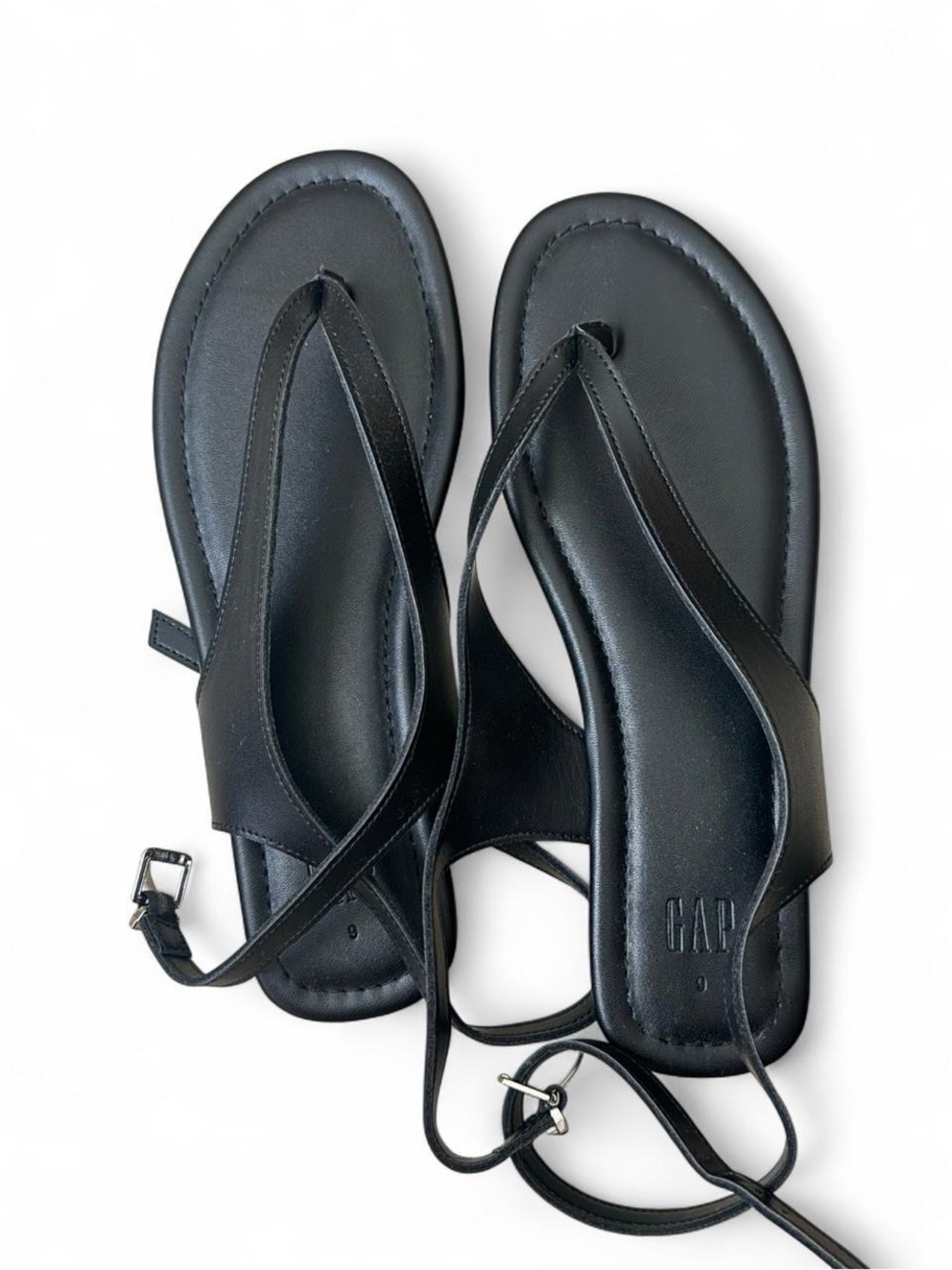 Completely new black sandals